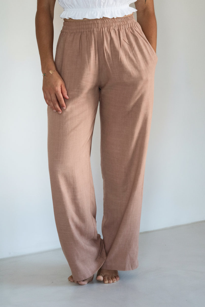 Pantalon femme en lin rose poudré